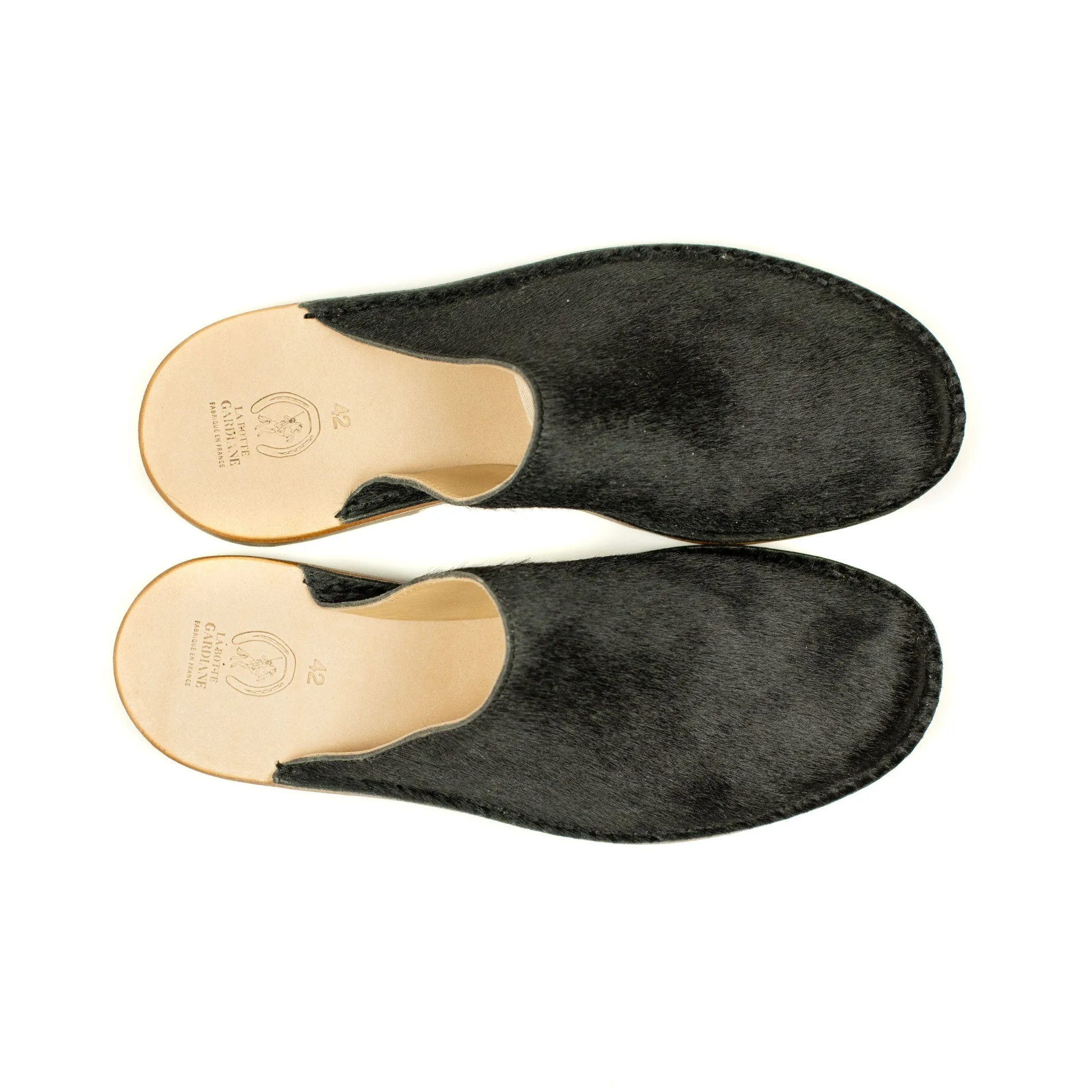 Exclusive mules in black hair-on calf